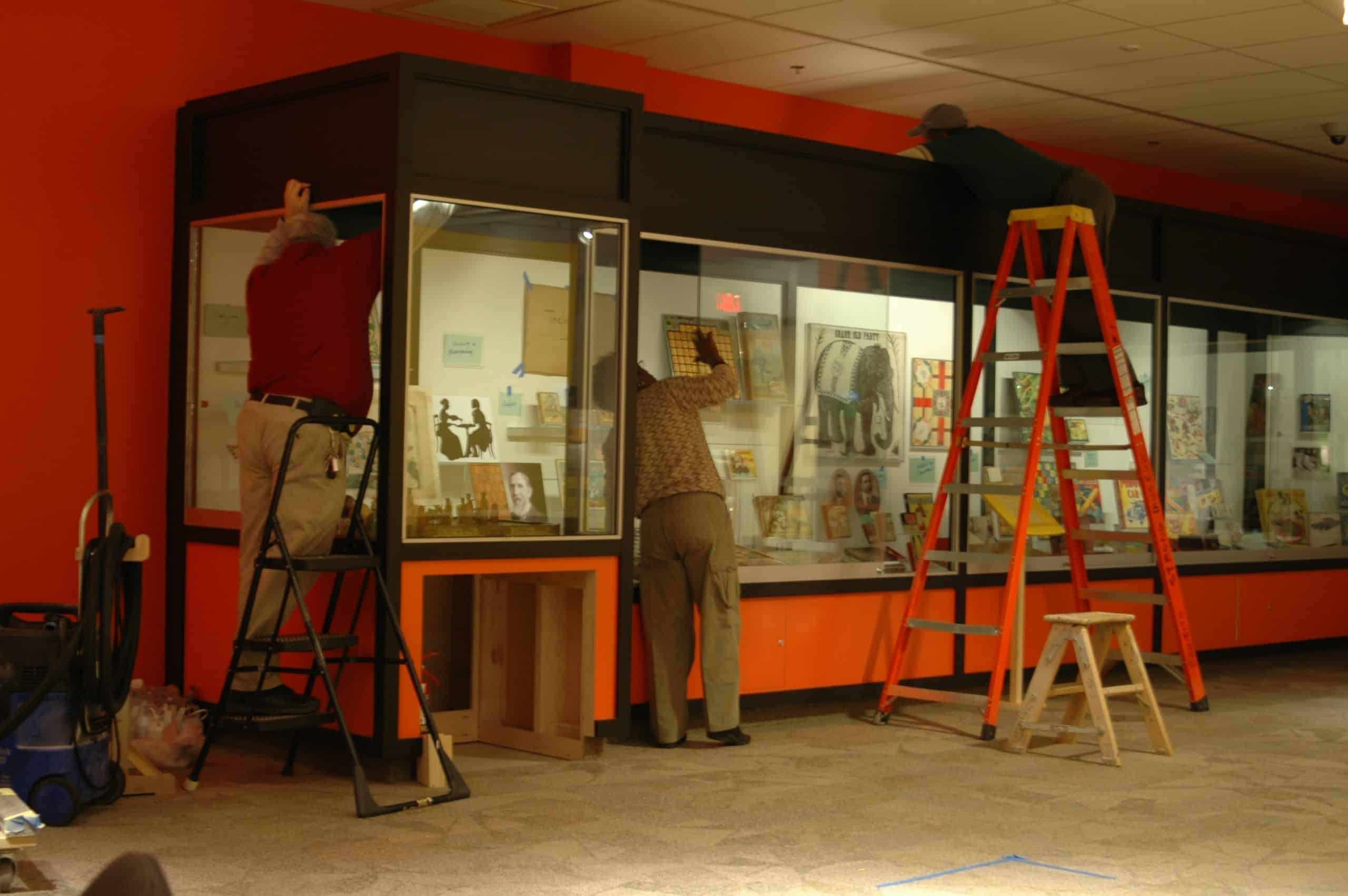 NoUVIR team installing the fiber optic lighting system (the acronym NoUVIR stands for NO ULTRAVIOLET or INFRARED). L to R: Matthew Miller, Carolyn Hudson, & Clarence Hudson. Courtesy of The Strong, Rochester, New York.