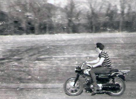 It runs, finally! Rick enjoying one of his first rides ever. Courtesy of Rick Sherin.