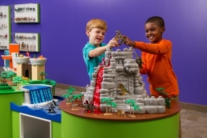 Playing with dinosaurs, The Strong, Rochester, New York. Playing with dinosaurs, The Strong, Rochester, New York.