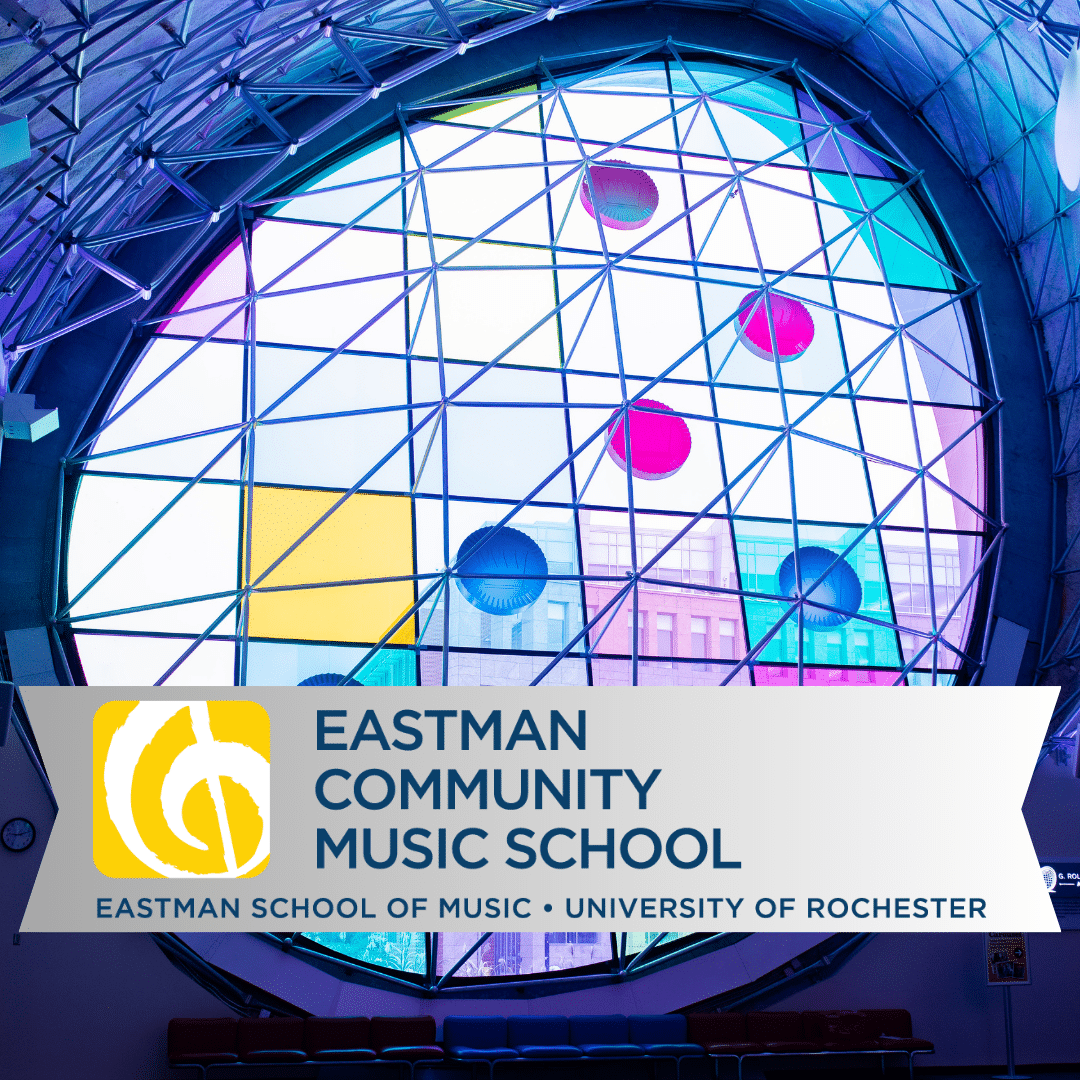 The window in Adams Atrium with the Eastman Community Music School Logo
