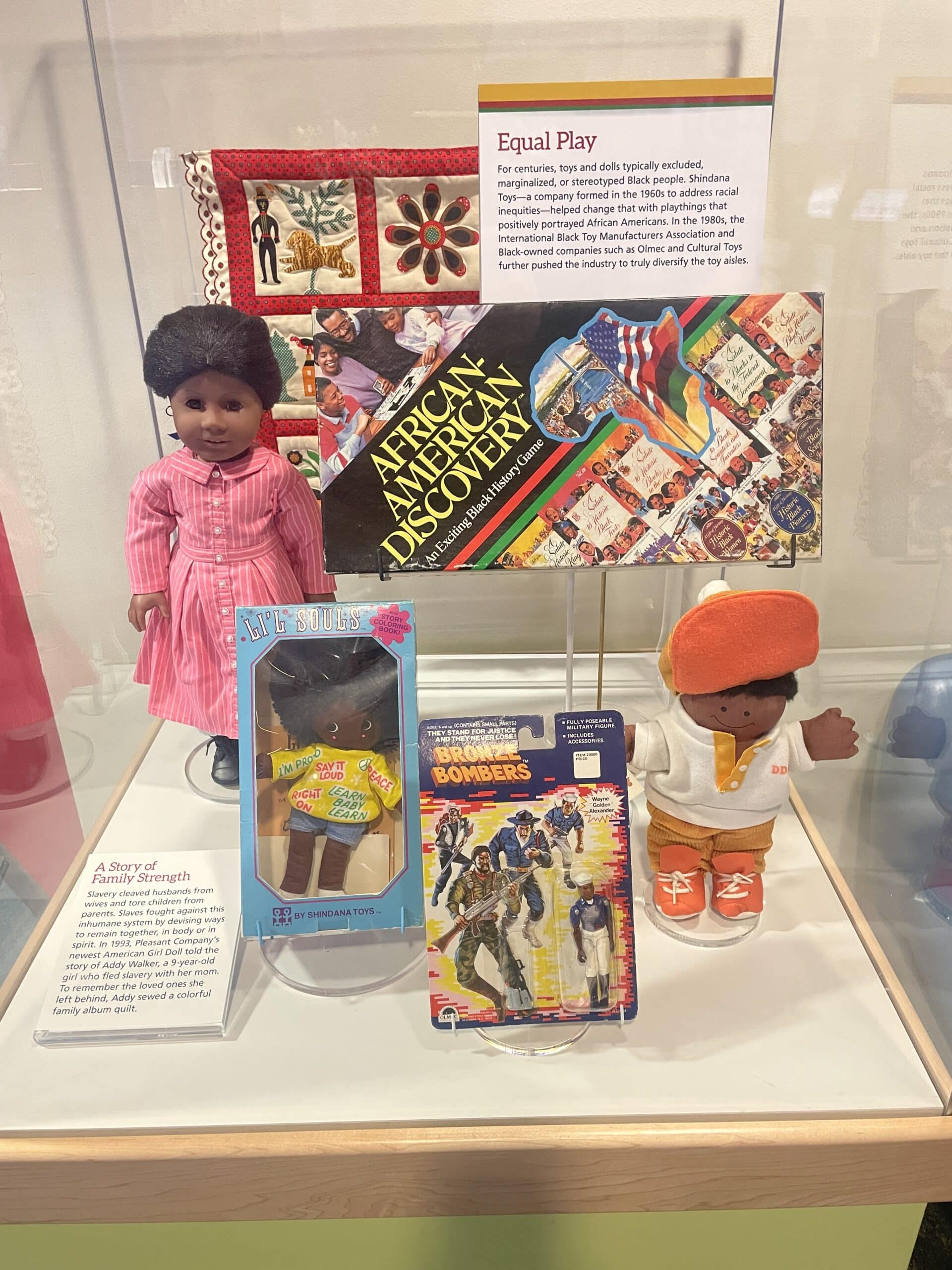 Display case featuring Black toys